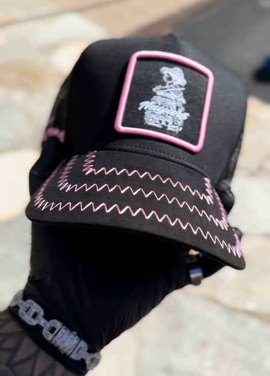 A KORA PINK TRUCKER HAT